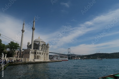 Ortakoy Mosque with Bosphorus Bridge - Connection between Europe and Asia in Istanbul, Turkey