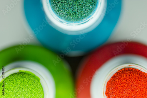 A macro shot of three bingo daubers