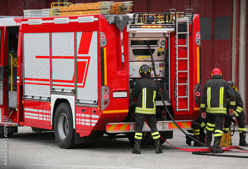 fire truck in an emergency and active people