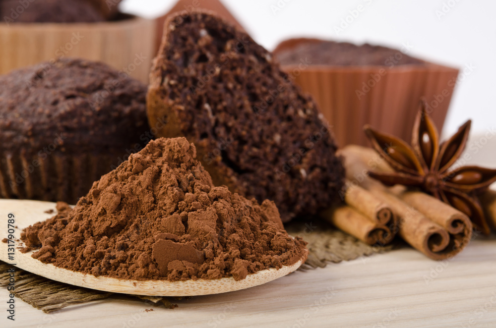 cinnamon stick, star of anise, cocoa powder and chocolate muffin cinnamon stick, star of anise, cocoa powder and chocolate muffin