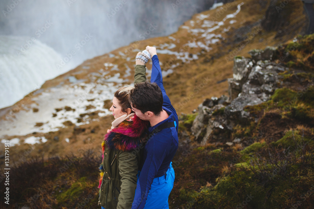 Couple Enjoying Waterfall View