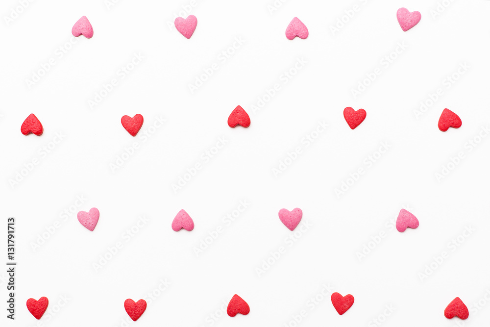 background of small red and pink hearts. Festive background for Valentine's day, birthday, wedding, holiday, postcard, party