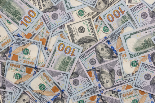 pile of new one hundred US dollar bills