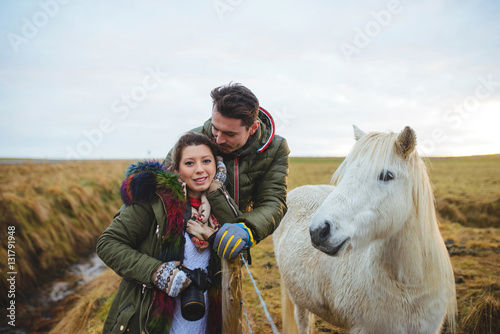 Couple and White Horse