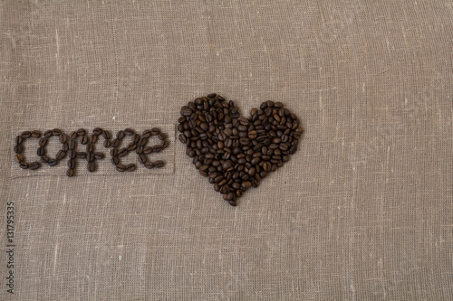 Roasted coffee beans, flax, coffee word in the English language, coffee, card, heart of coffee shape of heart,