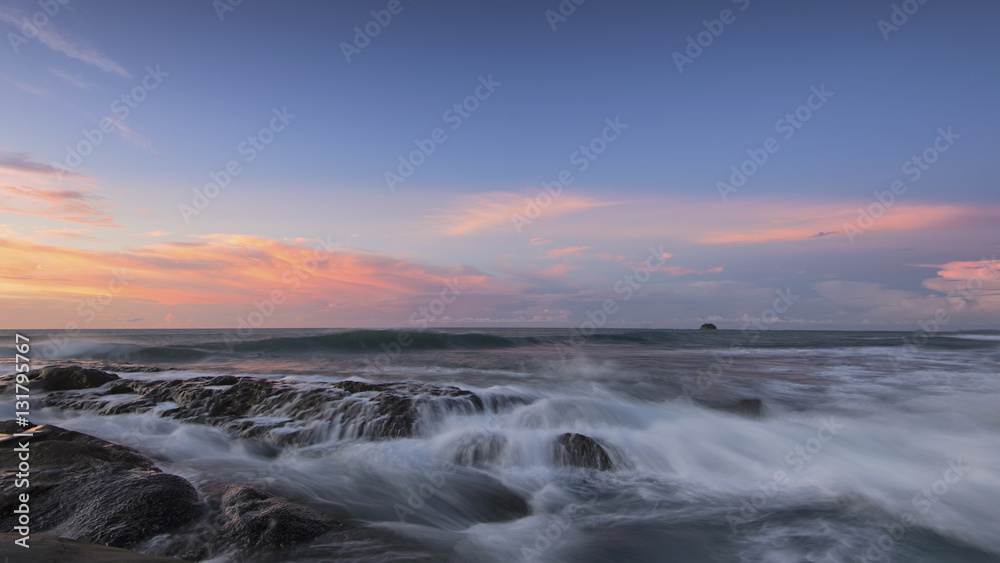 Fototapeta premium The beautiful scenery of the dusk in Kudat Sabah Borneo. Long exposure photograph with grain. Image contain certain grain or noise and soft focus.