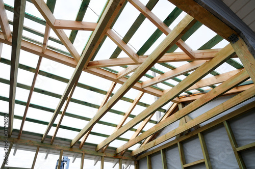 Slika na platnu Wooden roof frame, the roof structure.