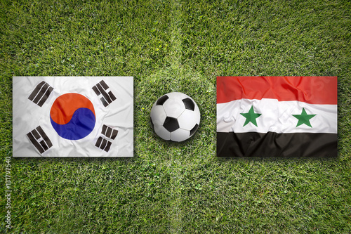 South Korea vs. Syria flags on soccer field