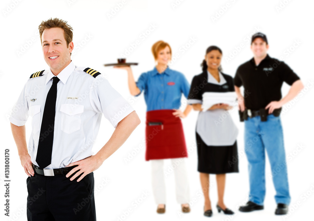 Occupations: Cheerful Pilot Stands With Group of Employees Occupations: Cheerful Pilot Stands With Group of Employees