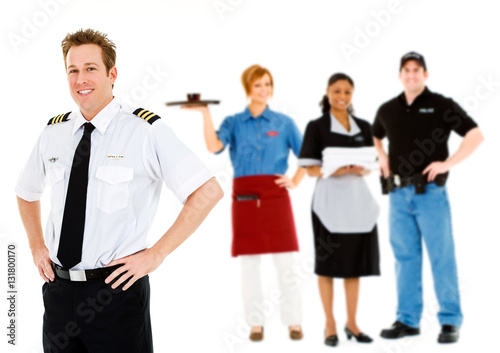 Occupations: Cheerful Pilot Stands With Group of Employees