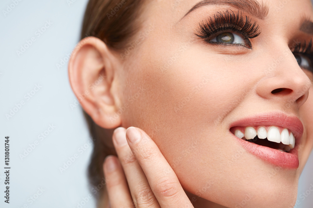 Long Black Eyelashes. Woman Face With Soft Skin, Beauty Makeup Long Black Eyelashes. Woman Face With Soft Skin, Beauty Makeup