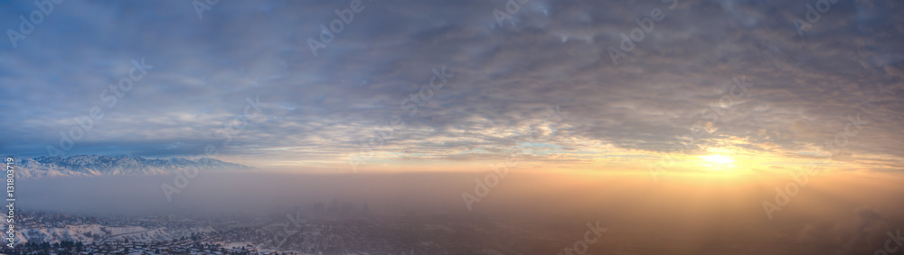 Fototapeta premium Sunset over the smog covering Salt Lake City 