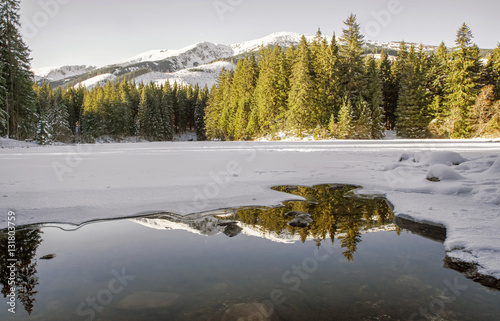 Frozen tarn Vrbicke pleso, Slovakia photo