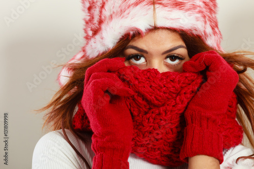 Woman with red winter clothing.