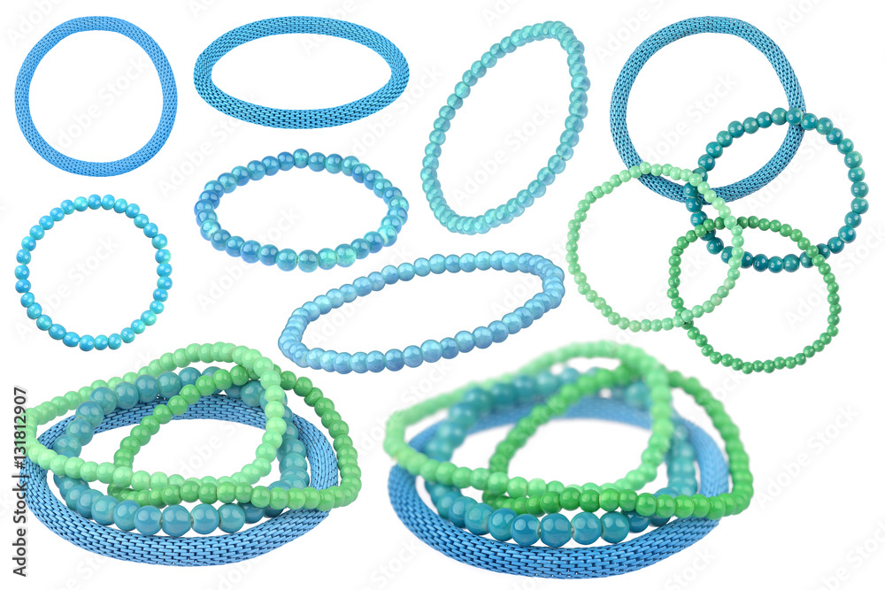 Many instances of blue and green elastic bracelets made of pearl Many instances of blue and green elastic bracelets made of pearl