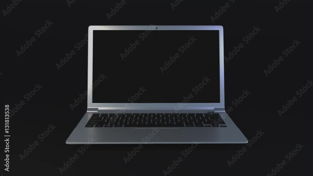 Silver Laptop on a Dark Background with Alpha Channel Silver Laptop on a Dark Background with Alpha Channel