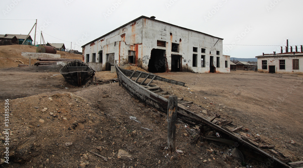 remnants of the old boat,abandoned building fish processing