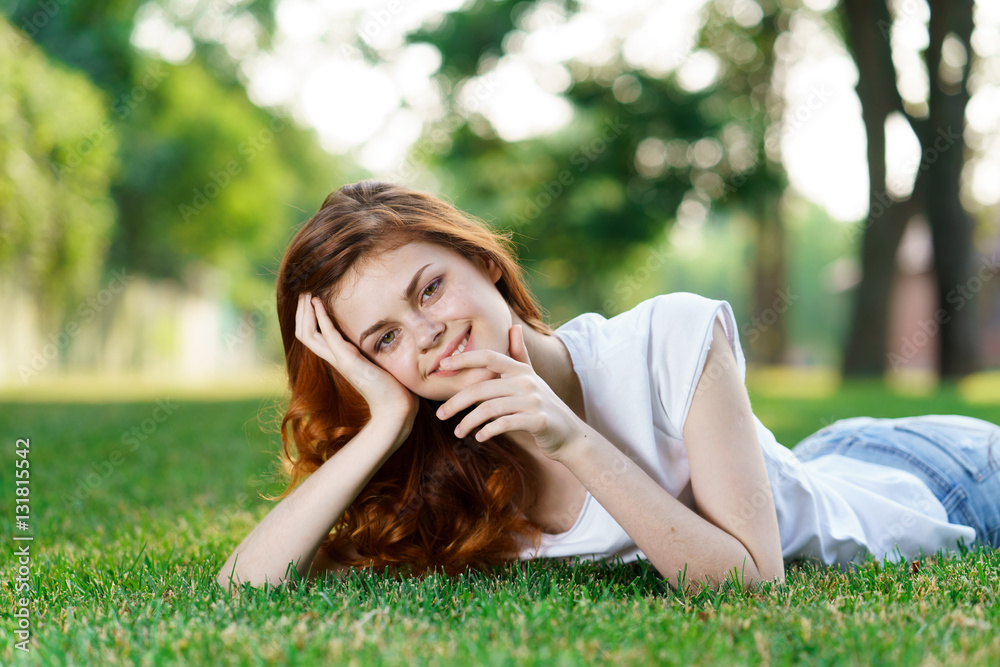 lovely woman in white t-shirt resting on green grass in parklovely woman in white t-shirt resting on green grass in park lovely woman in white t-shirt resting on green grass in parklovely woman in white t-shirt resting on green grass in park