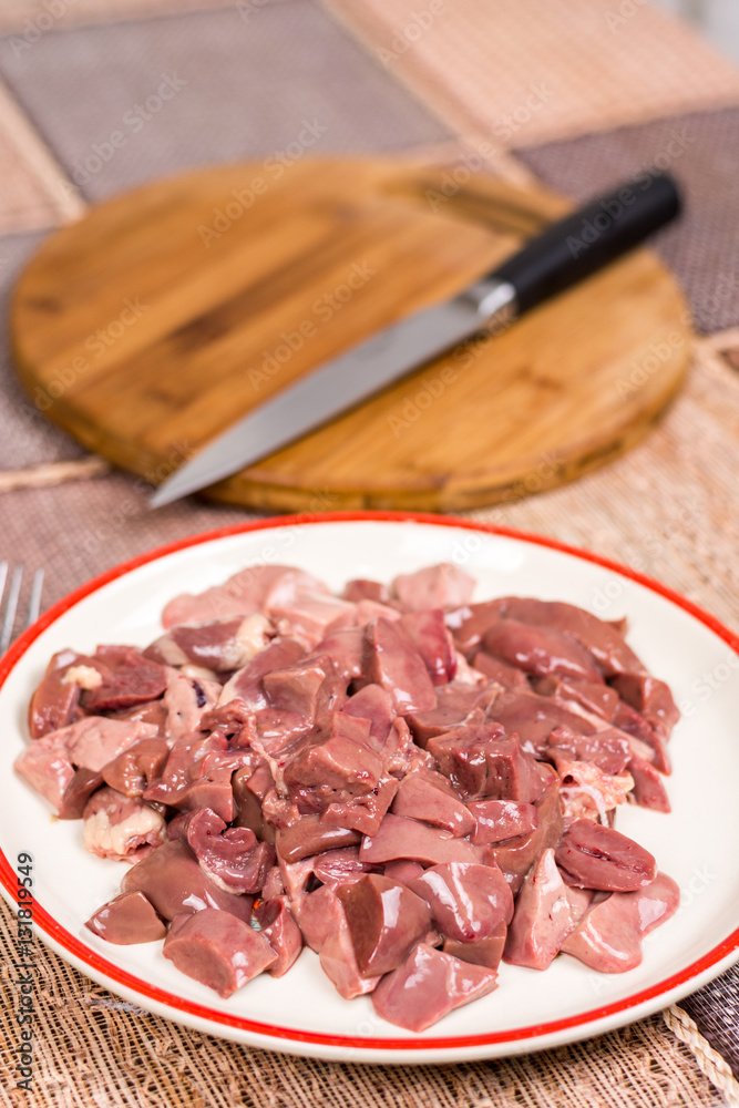 Sliced raw chicken liver on the plate