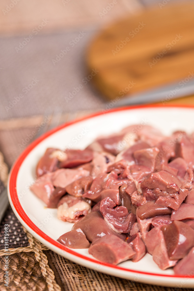 Closeup macro sliced chicken liver on the plate