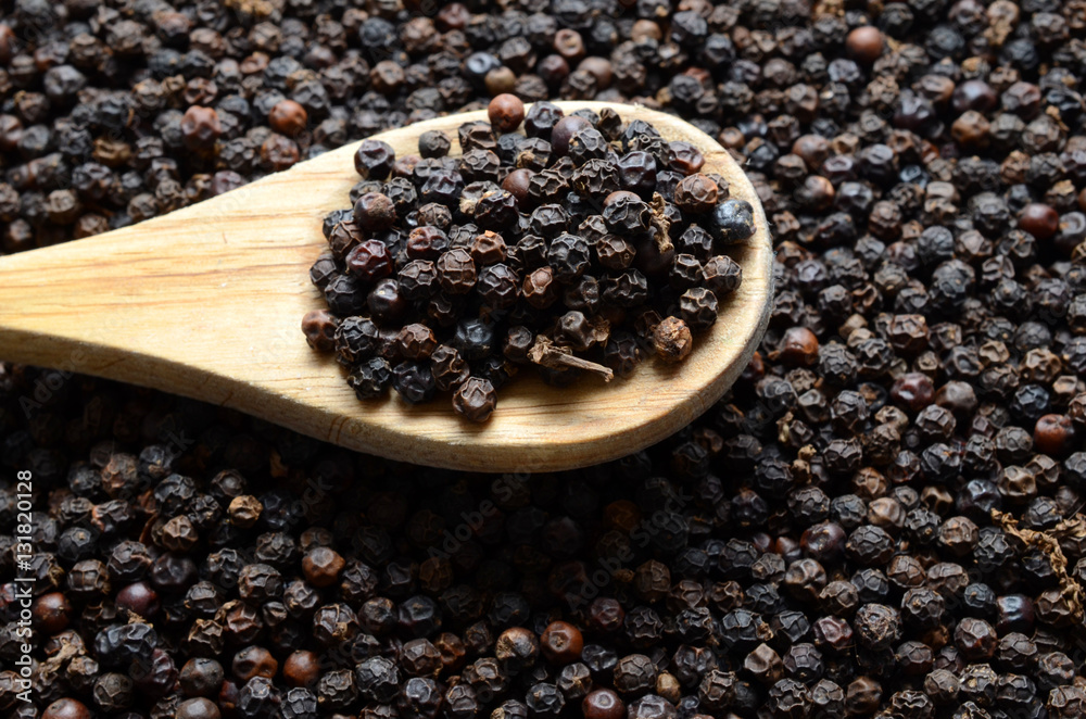 dried black peppercorns background dried black peppercorns background