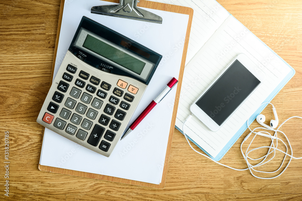 clipboard with a pen and notebook, calculator clipboard with a pen and notebook, calculator