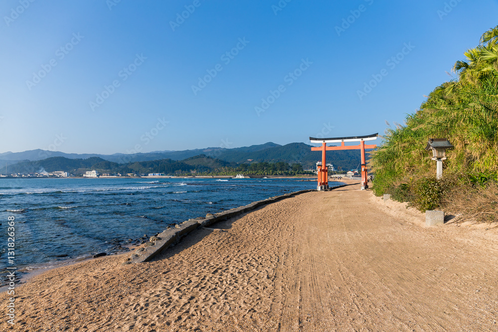 Red Torii in Aoshima Shrine with sunshine Red Torii in Aoshima Shrine with sunshine