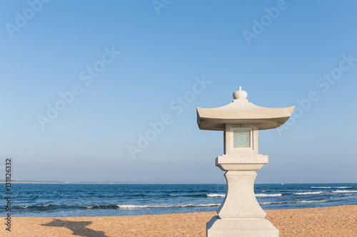 Stone lantern in the beach
