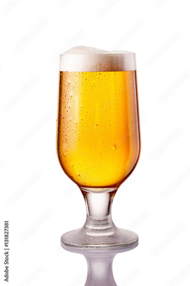 light cold beer in frosty glass isolated on white light cold beer in frosty glass isolated on white