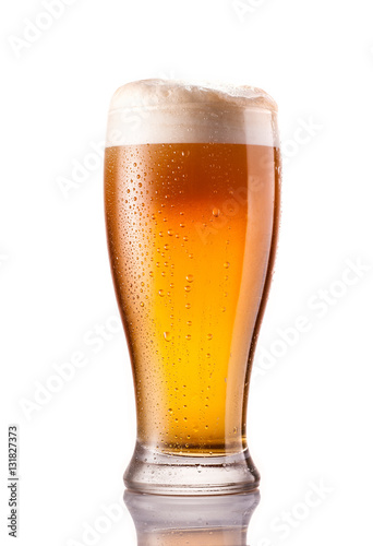 light cold beer in frosty glass isolated on white