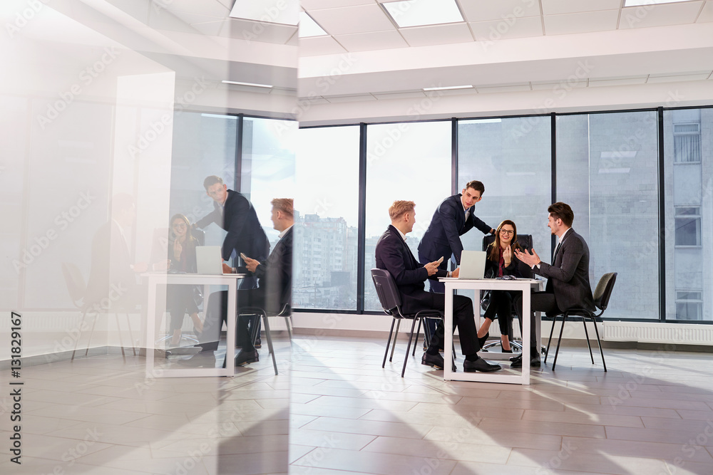 Business people team working in a modern office. Business people team working in a modern office.