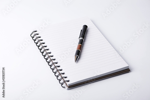 Clear paper and pen on white background.