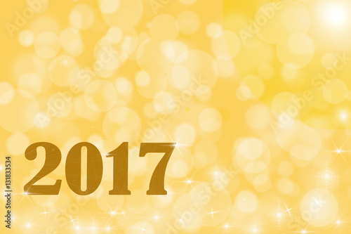2017 on gold background with bokeh effect
