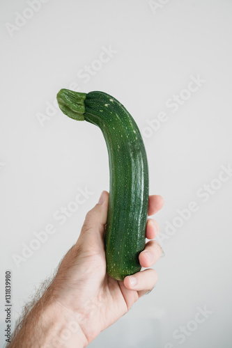 Organic Zuchinni in male hand
