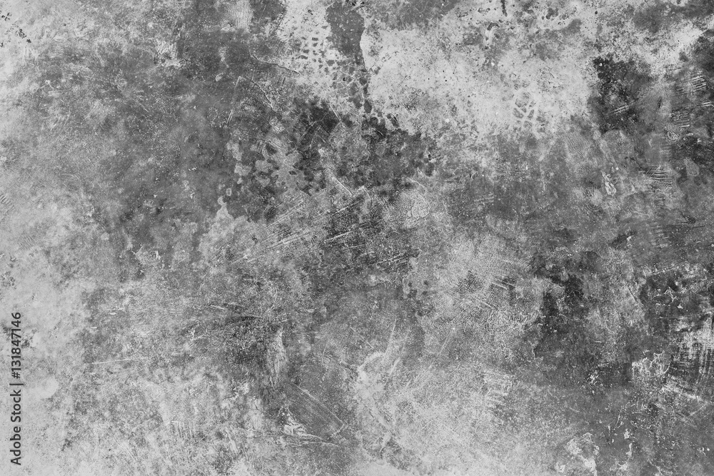 Dark grunge textured cement wall closeup