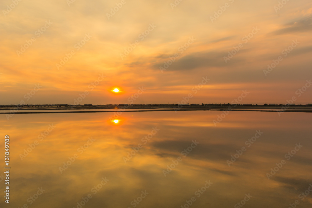 salt field sunset Phetchaburi, Thailand