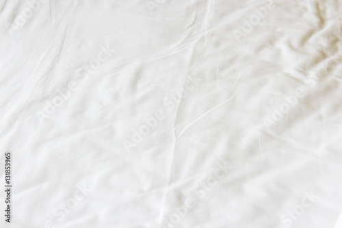 white crumpled bed sheet texture background