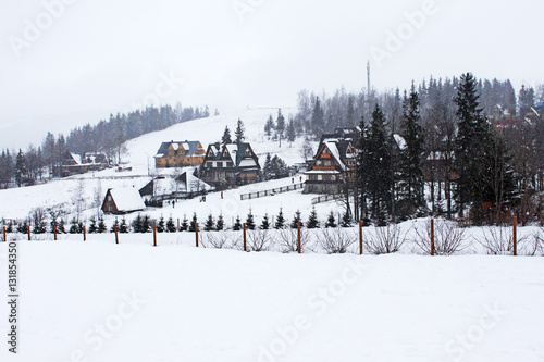 Snowing in Tatry mountains. Zakopane city. Poland.