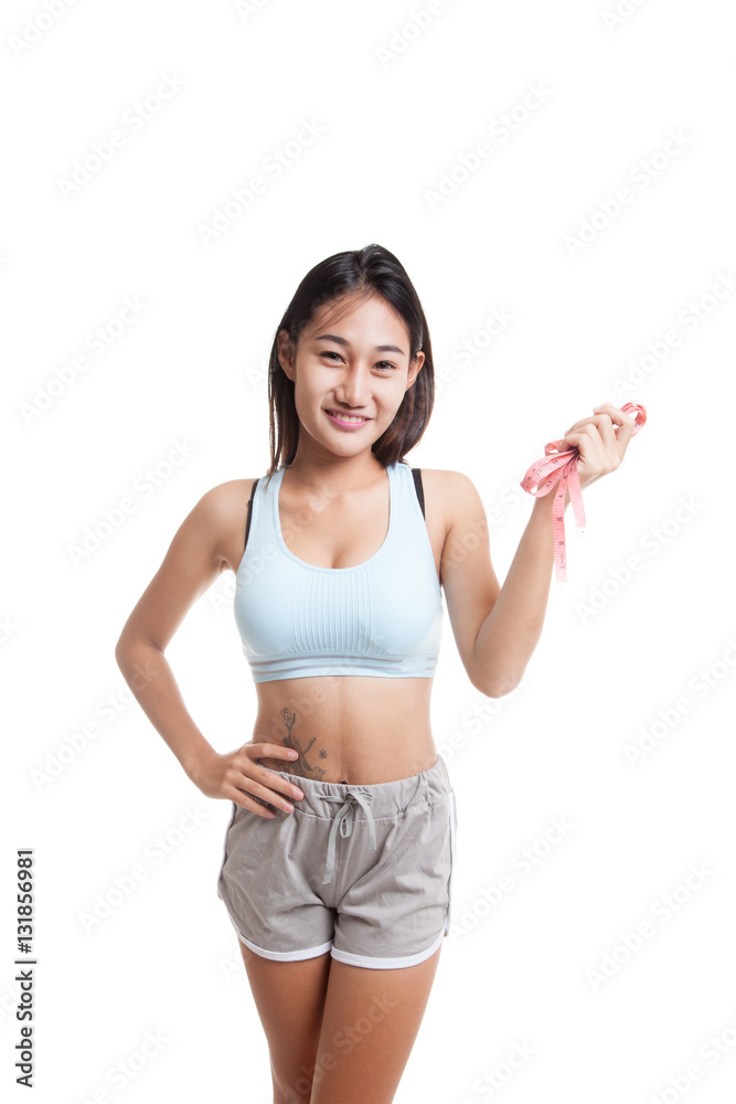 Beautiful Asian healthy girl with measuring tape. Beautiful Asian healthy girl with measuring tape.