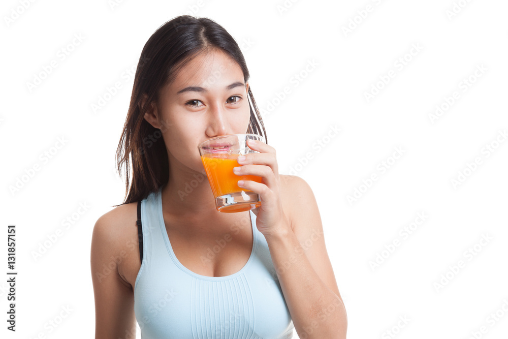 Beautiful Asian healthy girl drinking orange juice. Beautiful Asian healthy girl drinking orange juice.