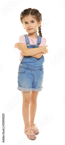 Cute little girl on white b...