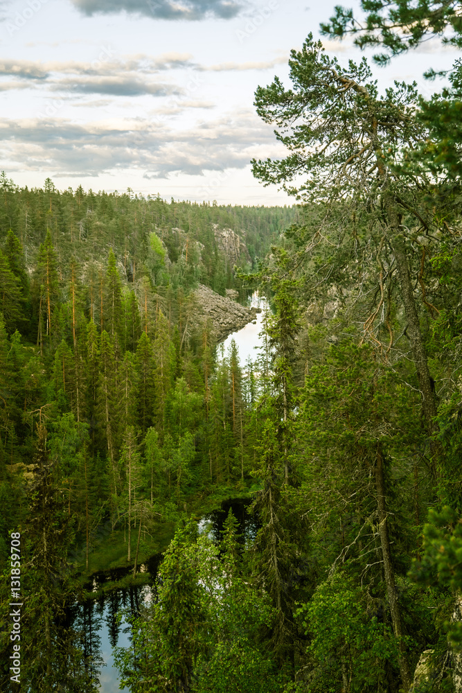 A beautiful lake and forest landscape from Hossa in Finland