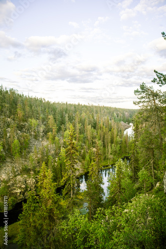 A beautiful lake and forest landscape from Hossa in Finland photo