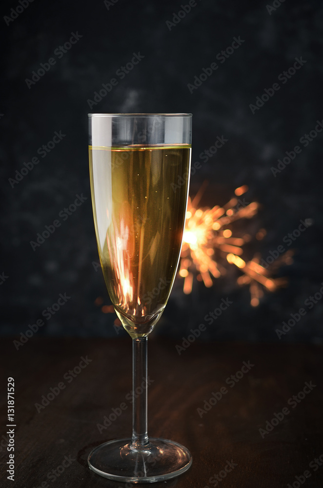 New Year champagne with sparkler New Year champagne with sparkler