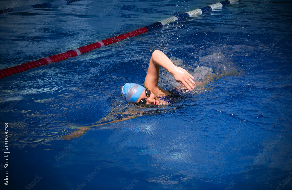 Young woman swimmer