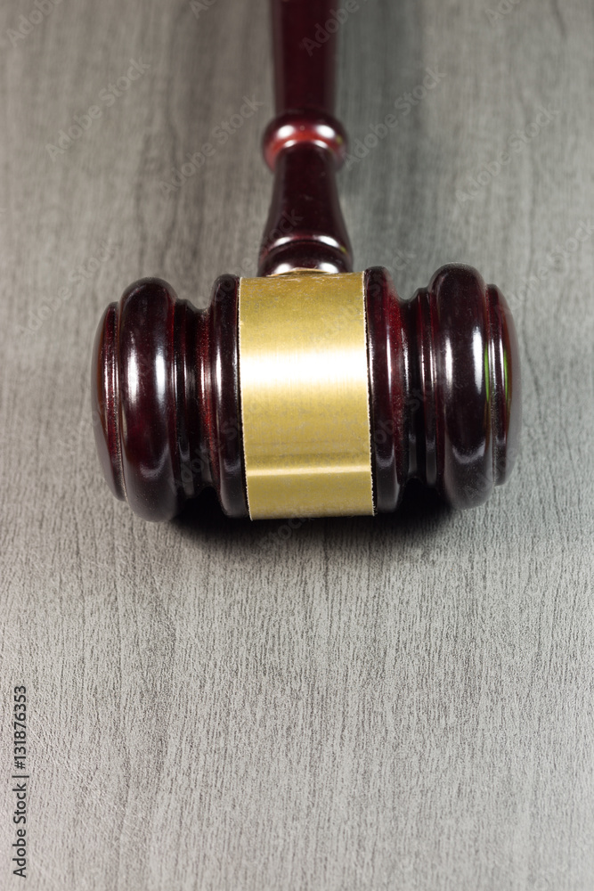 Law gavel on gray leather and space for text Law gavel on gray leather and space for text
