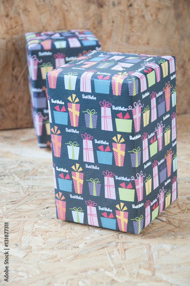 close up of gift box on wood table close up of gift box on wood table