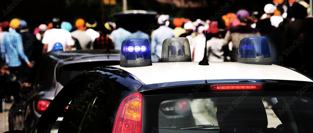 flashing lights of the police car to patrol the city flashing lights of the police car to patrol the city