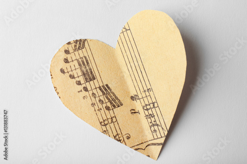 Paper heart with notes on w...