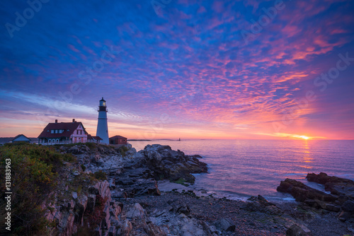 Vibrant sunrise at Portland Head Lighthouse in Maine 